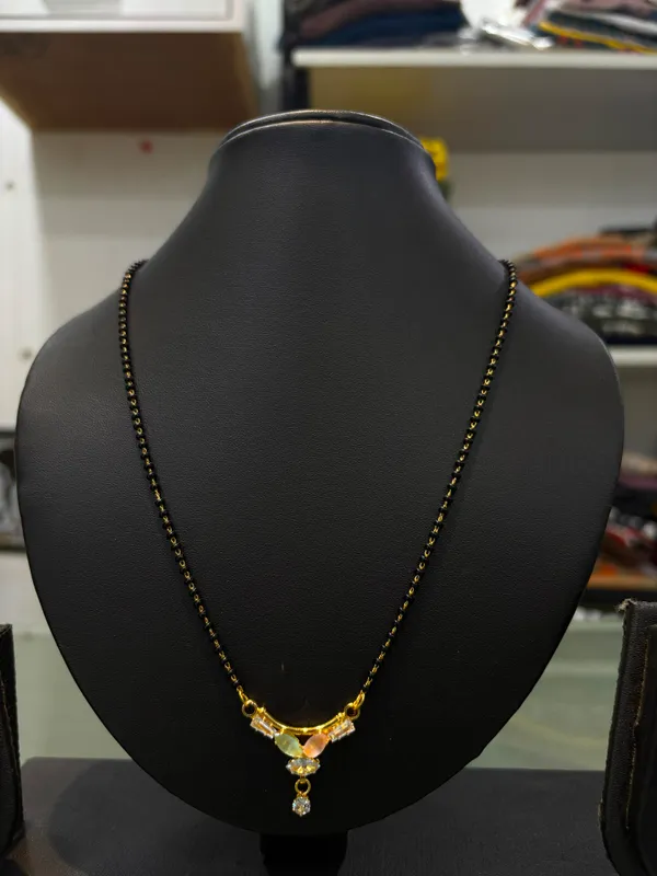 Black_And_Gold_Plated_Brass_Regal_Stone_Pendant_Mangalsutra_For_Women