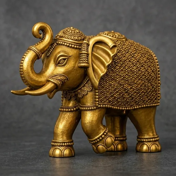 Gold_Brass_Elephant_Figurine_Raised_Trunk_Ornate_Detailing