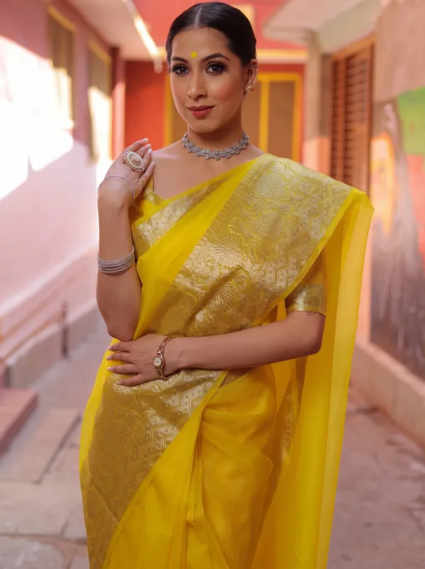 Premium_Yellow_Organza_Silk_Saree_with_Elegant_Golden_Woven_Border
