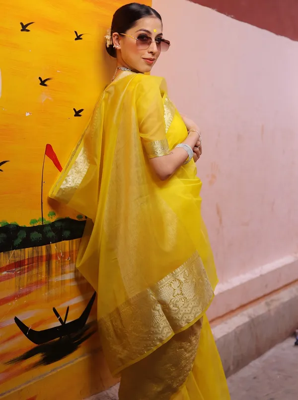 Premium_Yellow_Organza_Silk_Saree_with_Elegant_Golden_Woven_Border