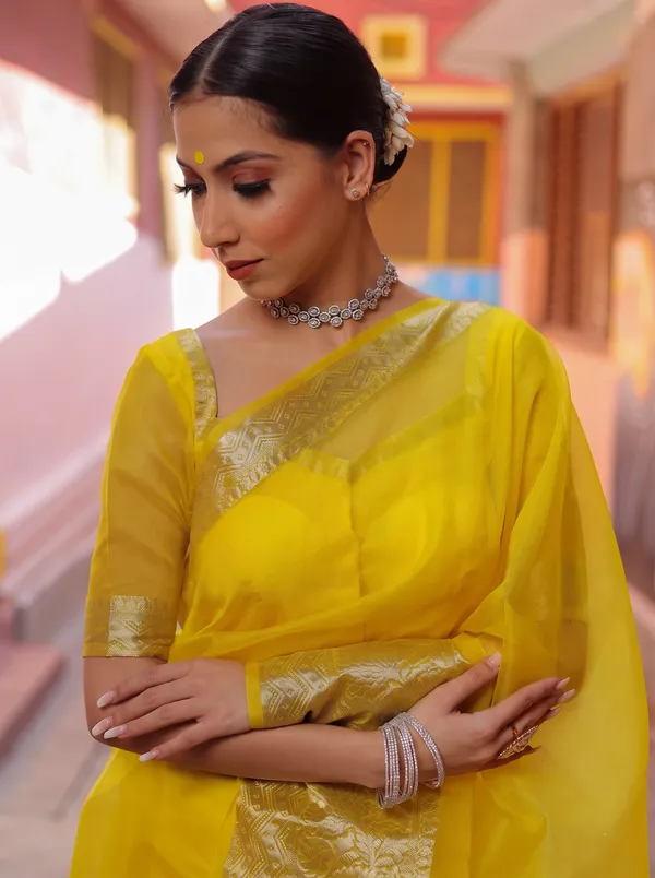 Premium_Yellow_Organza_Silk_Saree_with_Elegant_Golden_Woven_Border
