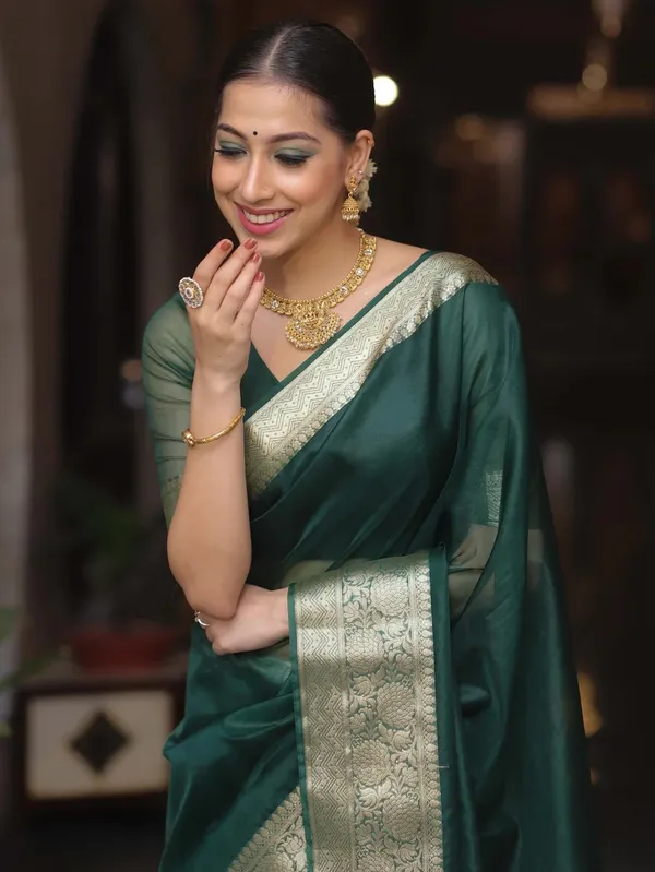 Premium_Green_Organza_Silk_Saree_with_Elegant_Golden_Woven_Border