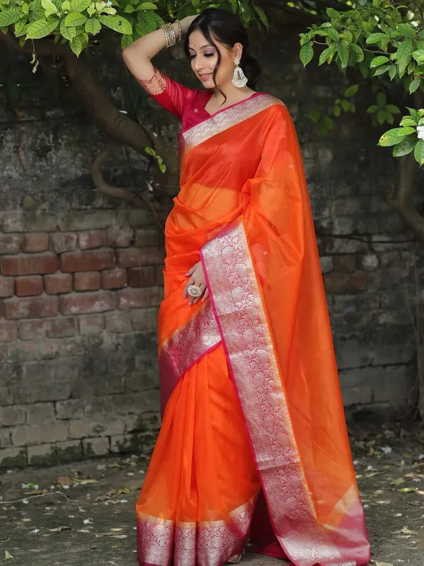 Premium_Orange_Organza_Silk_Saree_with_Elegant_Golden_Woven_Border
