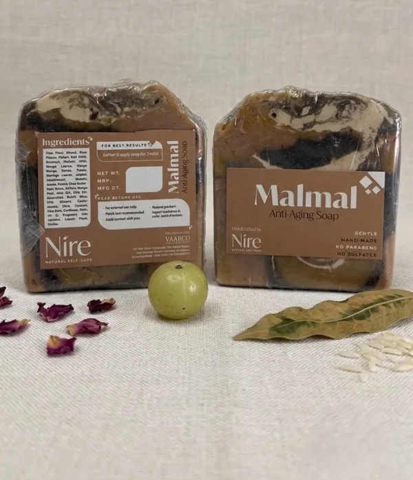Nire_Nikhaar_:_Multani_Mitti_Kojic_Acid_Anti_Tan_Soap_/_Nire_Malmal_:_Saffron_Sandalwood_for_Fine_lines_n_Aging_Soap__(Pack_Of_2_)