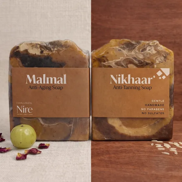 Nire_Nikhaar_:_Multani_Mitti_Kojic_Acid_Anti_Tan_Soap_/_Nire_Malmal_:_Saffron_Sandalwood_for_Fine_lines_n_Aging_Soap__(Pack_Of_2_)