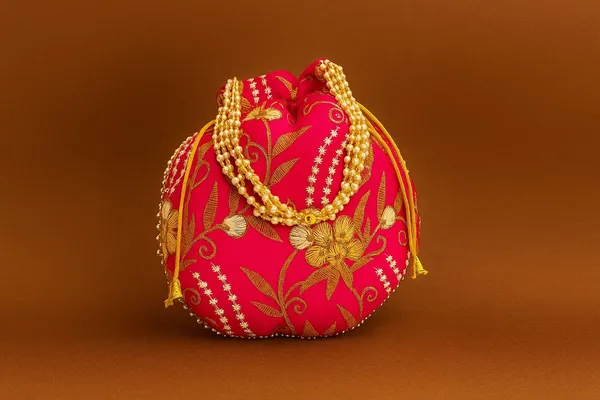 Handcrafted_Zari_Work_Potli_Bag_with_Statement_Pearl_Handle_-_Royal_Festive_Batwa-Pink
