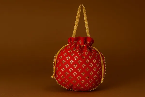 Handcrafted_Silk-Blend_Potli_Bag_with_Golden_Zari_Motifs_&_Pearl_Handle-Red