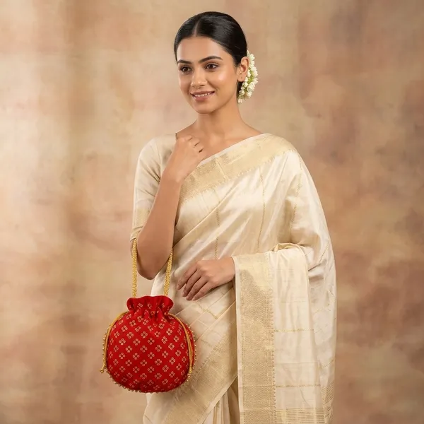 Handcrafted_Silk-Blend_Potli_Bag_with_Golden_Zari_Motifs_&_Pearl_Handle-Red
