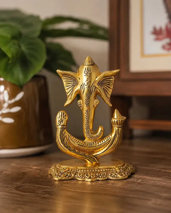 Golden_Lord_Ganesha_Idol_for_Home_Temple_&_Office_Decor_–_Decorative_Metal_Ganesh_Ji_Statue_for_Puja,_Vastu_&_Spiritual_Gift