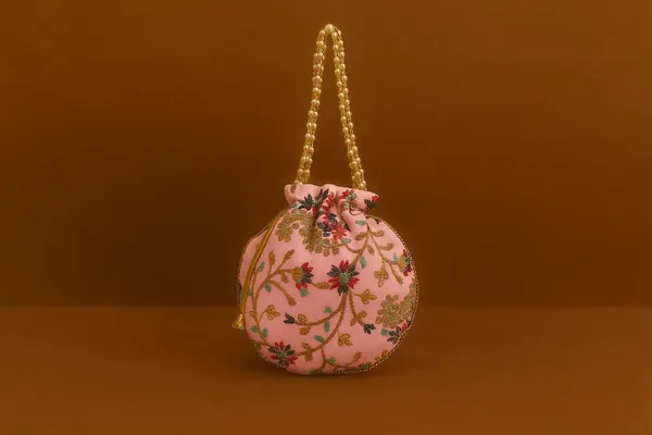 Handcrafted_Embroidered_Potli_Bag_with_Pearl_Handle_-_Traditional_Rajasthani_Wedding_Batwa-Pink