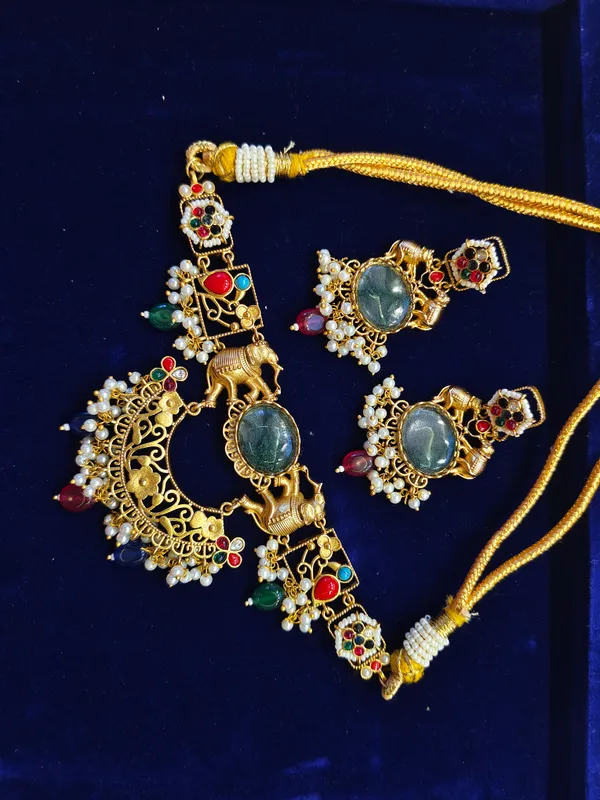 Multicolor_Gold_Toned_Brass_Elephant_Kundan_Pendant_Necklace_Set_For_Women