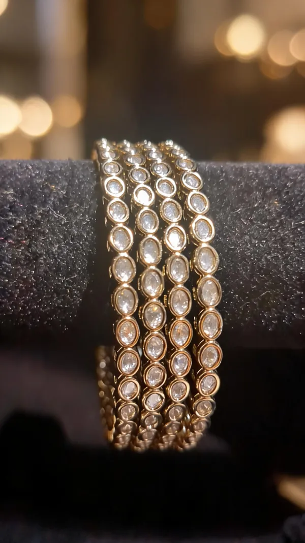 Gold-Tone_4-Piece_Bezel-Set_CZ_Slim_Bangle_Set