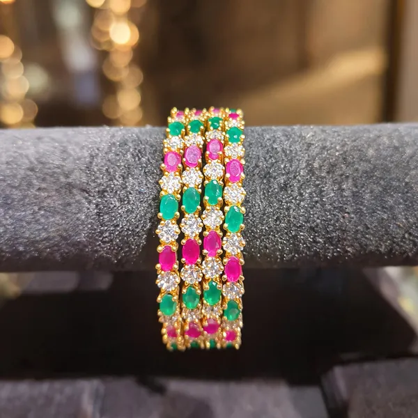 Gold-Tone_4-Piece_Ruby,_Emerald_&_CZ_Bangle_Set