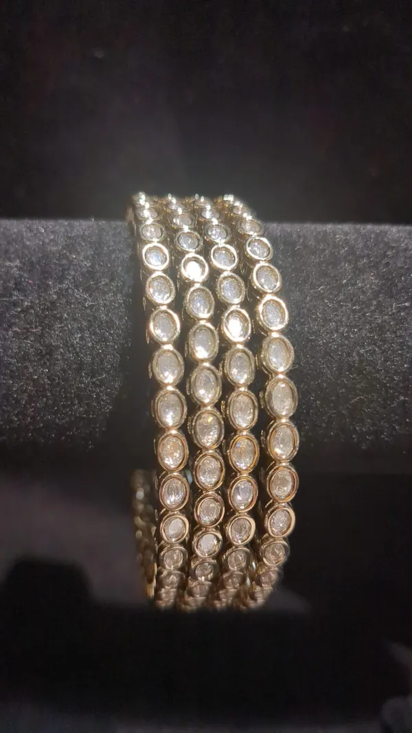 Gold-Tone_4-Piece_Bezel-Set_CZ_Slim_Bangle_Set