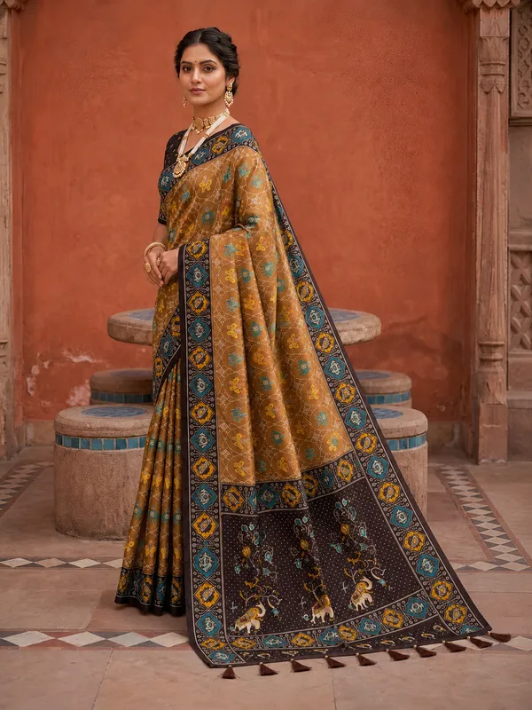 Coffee_Ajrakh_Printed_Designer_Patola_Saree_with_Contrast_Border_&_Tassel_Pallu