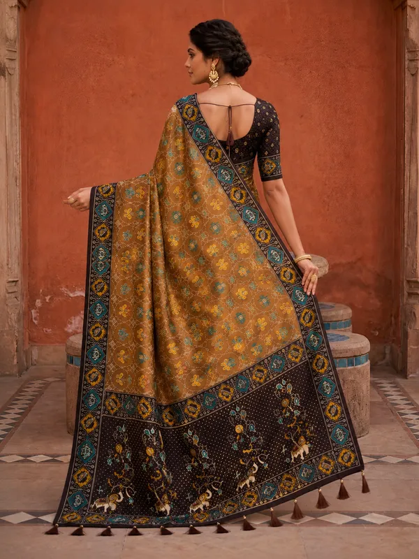 Coffee_Ajrakh_Printed_Designer_Patola_Saree_with_Contrast_Border_&_Tassel_Pallu