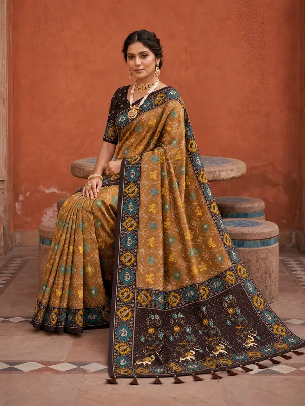 Coffee_Ajrakh_Printed_Designer_Patola_Saree_with_Contrast_Border_&_Tassel_Pallu