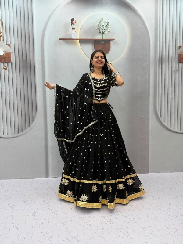 Elegant_Black_&_Gold_Embroidered_Georgette_Lehenga_Choli_Set_with_Lotus_Motif_Border