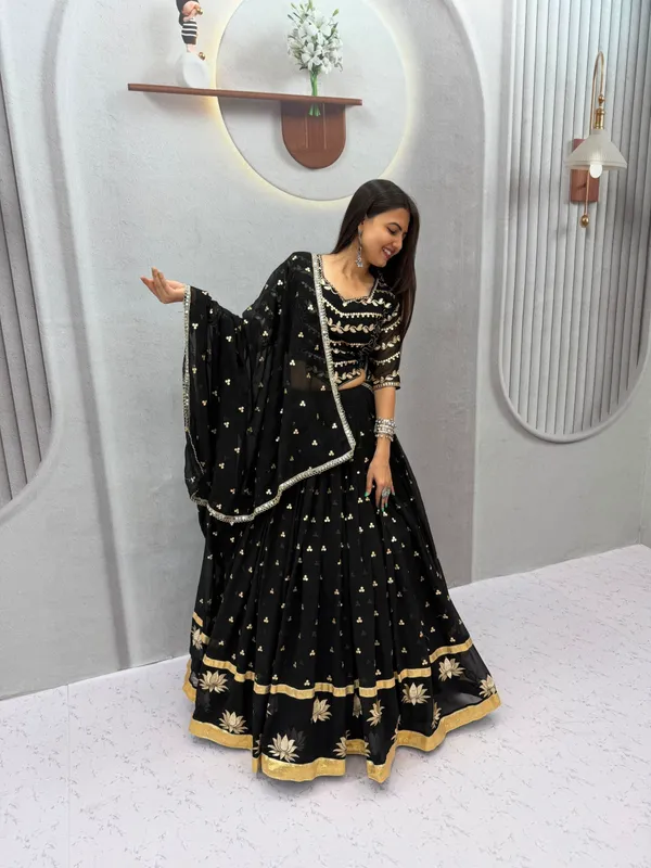 Elegant_Black_&_Gold_Embroidered_Georgette_Lehenga_Choli_Set_with_Lotus_Motif_Border