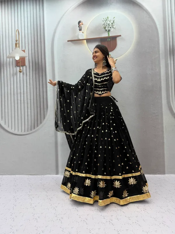 Elegant_Black_&_Gold_Embroidered_Georgette_Lehenga_Choli_Set_with_Lotus_Motif_Border