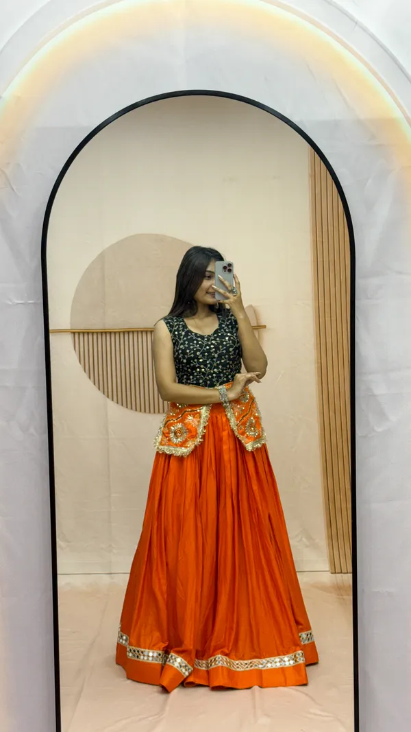 Elegant_Orange_Silk_Lehenga_with_Black_Embroidered_Blouse