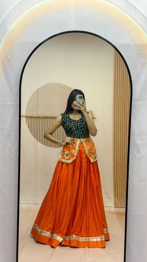 Elegant_Orange_Silk_Lehenga_with_Black_Embroidered_Blouse
