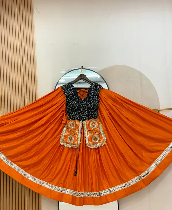 Elegant_Orange_Silk_Lehenga_with_Black_Embroidered_Blouse
