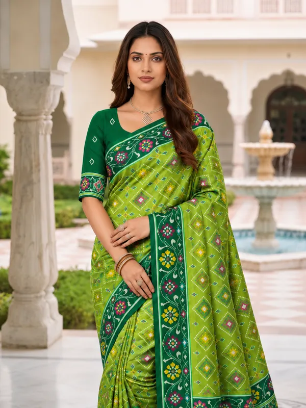 Elegant_Parrot_Green_Patola-Inspired_Printed_Saree_with_Contrast_Border
