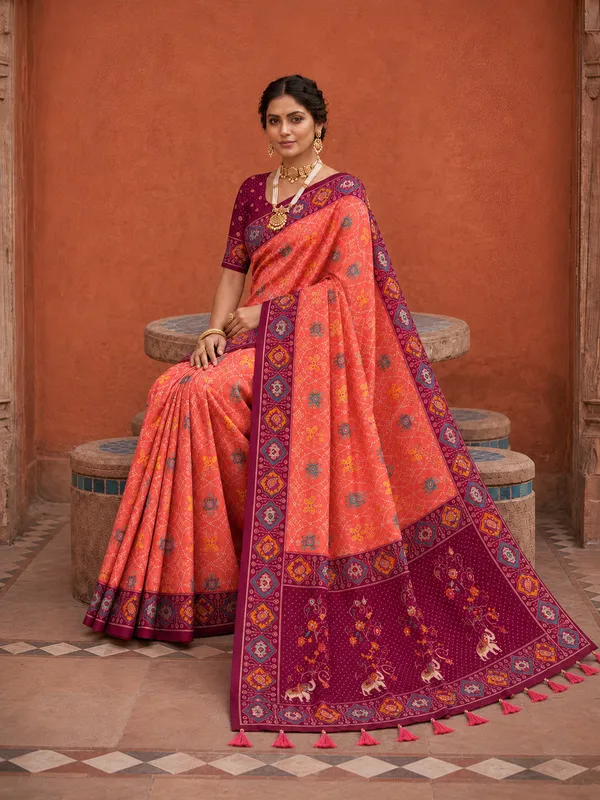 Gajri_Pink_Ajrakh_Printed_Designer_Patola_Saree_with_Contrast_Border_&_Tassel_Pallu