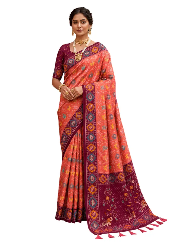Gajri_Pink_Ajrakh_Printed_Designer_Patola_Saree_with_Contrast_Border_&_Tassel_Pallu
