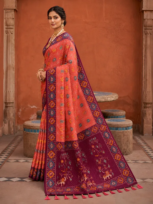 Gajri_Pink_Ajrakh_Printed_Designer_Patola_Saree_with_Contrast_Border_&_Tassel_Pallu