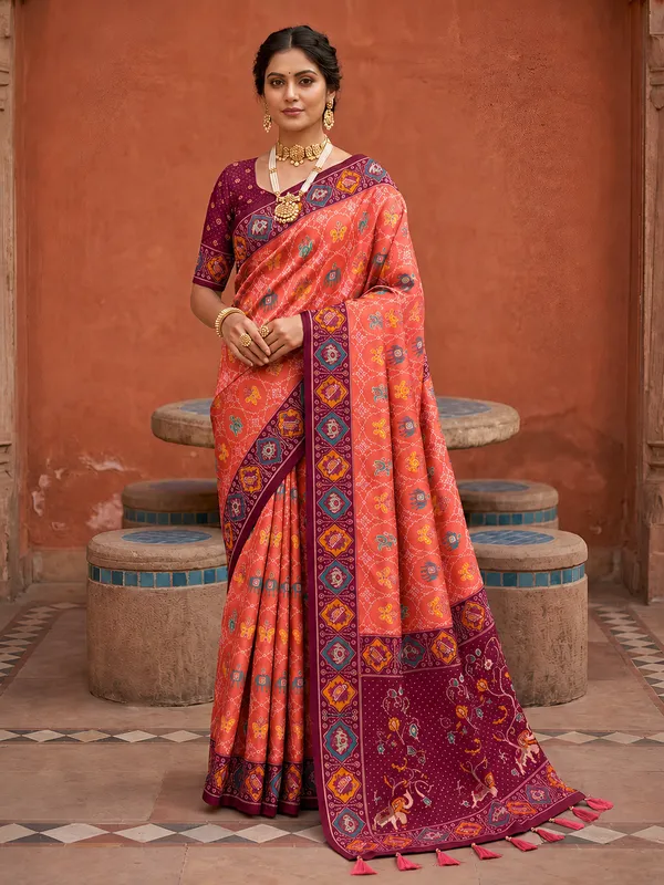 Gajri_Pink_Ajrakh_Printed_Designer_Patola_Saree_with_Contrast_Border_&_Tassel_Pallu