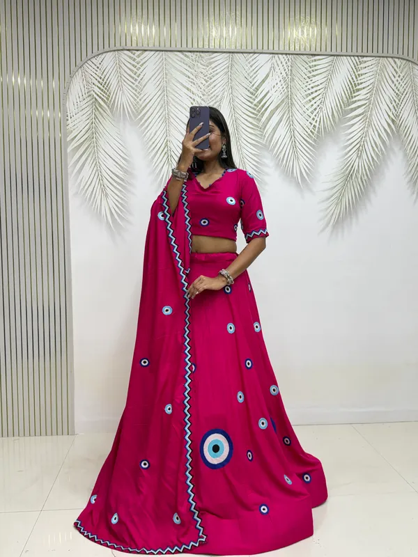 Hot_Pink_Evil_Eye_Printed_Lehenga_Choli_with_Embroidered_Dupatta