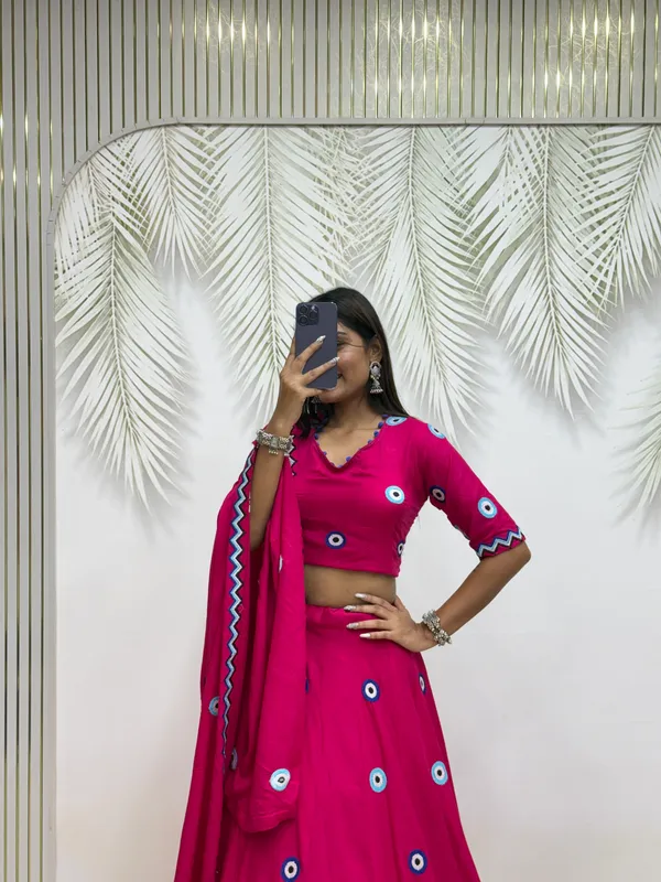Hot_Pink_Evil_Eye_Printed_Lehenga_Choli_with_Embroidered_Dupatta