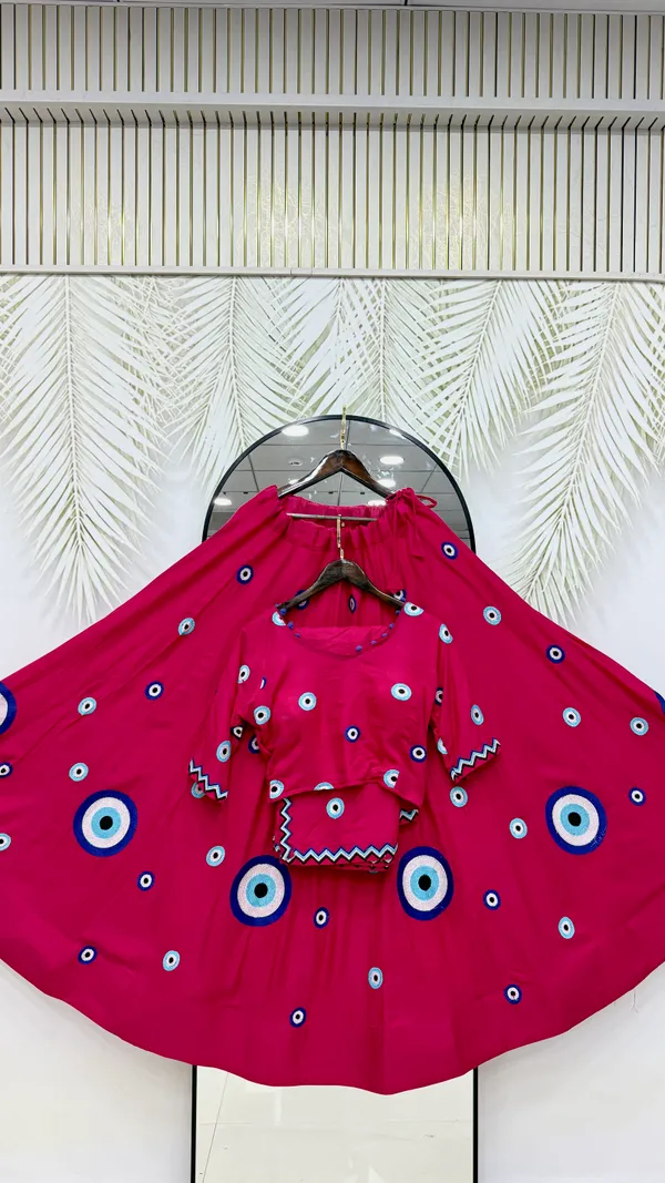 Hot_Pink_Evil_Eye_Printed_Lehenga_Choli_with_Embroidered_Dupatta