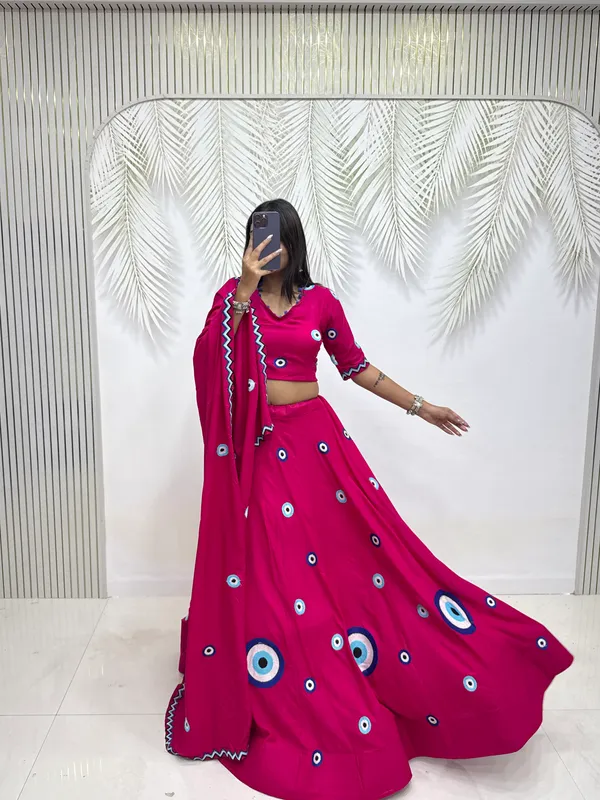 Hot_Pink_Evil_Eye_Printed_Lehenga_Choli_with_Embroidered_Dupatta