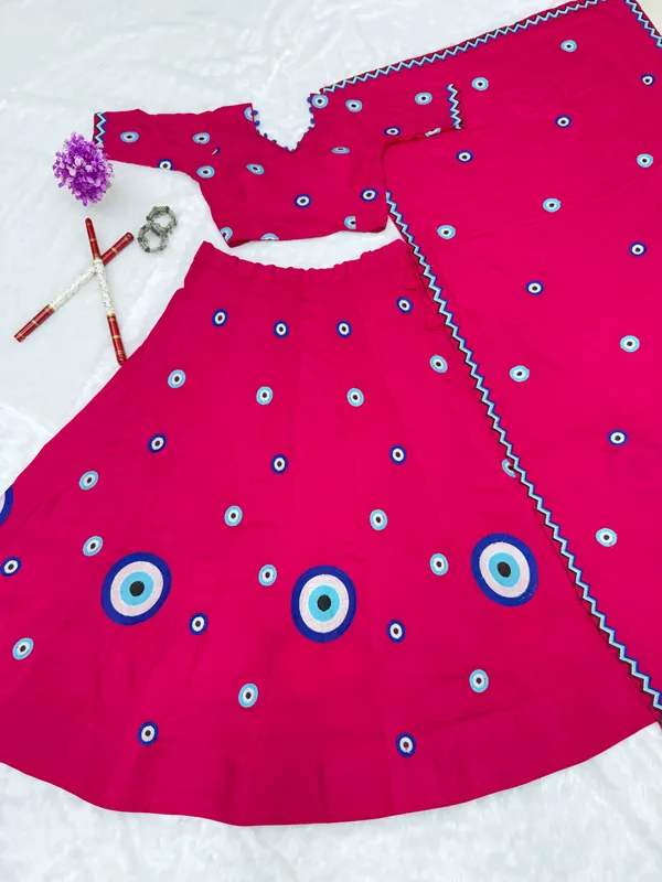 Hot_Pink_Evil_Eye_Printed_Lehenga_Choli_with_Embroidered_Dupatta