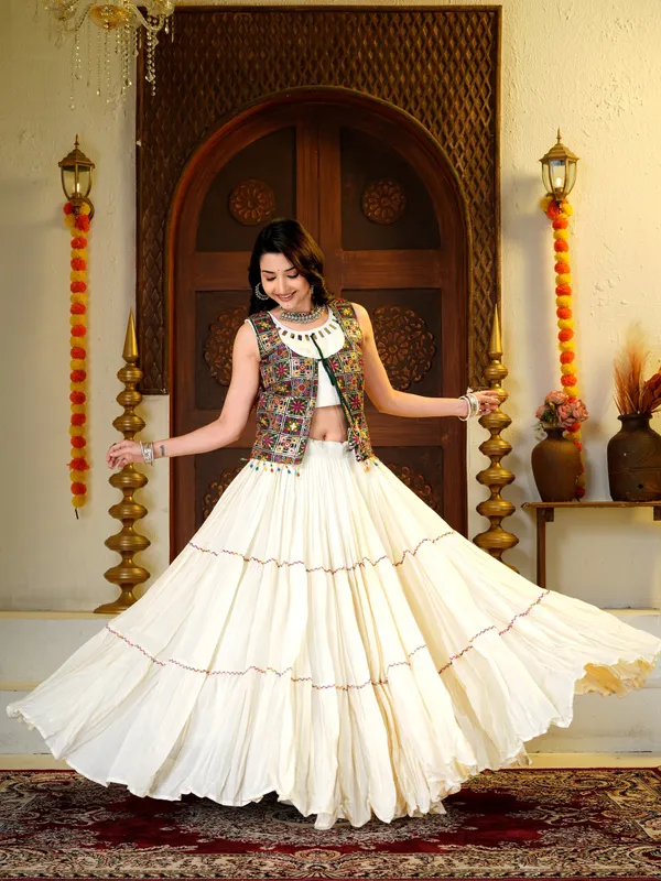 Ivory_Cotton_silk_Lehenga_Choli_with_Mirror_Work_&_Multicolor_Embroidered_Jacket