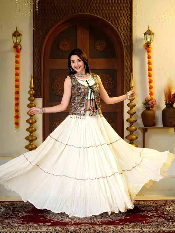 Ivory_Cotton_silk_Lehenga_Choli_with_Mirror_Work_&_Multicolor_Embroidered_Jacket