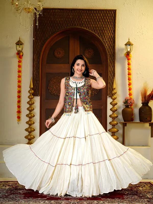 Ivory_Cotton_silk_Lehenga_Choli_with_Mirror_Work_&_Multicolor_Embroidered_Jacket