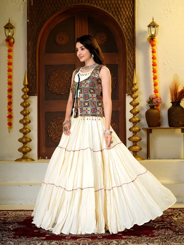 Ivory_Cotton_silk_Lehenga_Choli_with_Mirror_Work_&_Multicolor_Embroidered_Jacket