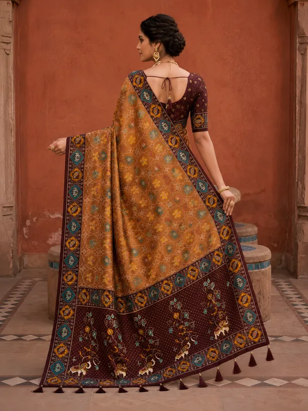 Maroon_Ajrakh_Printed_Designer_Patola_Saree_with_Contrast_Border_&_Tassel_Pallu