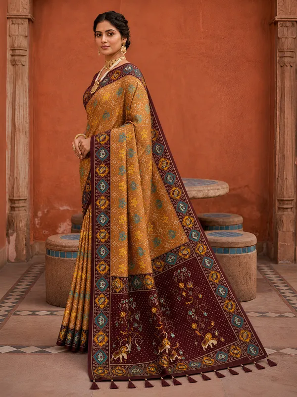 Maroon_Ajrakh_Printed_Designer_Patola_Saree_with_Contrast_Border_&_Tassel_Pallu