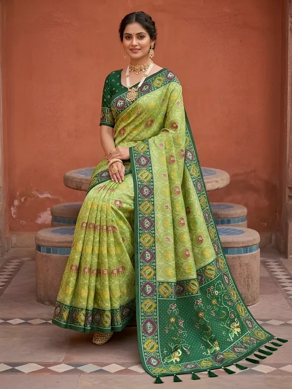 Parrot_Green_Ajrakh_Printed_Designer_Patola_Saree_with_Contrast_Border_&_Tassel_Pallu