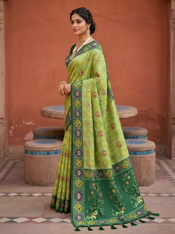 Parrot_Green_Ajrakh_Printed_Designer_Patola_Saree_with_Contrast_Border_&_Tassel_Pallu