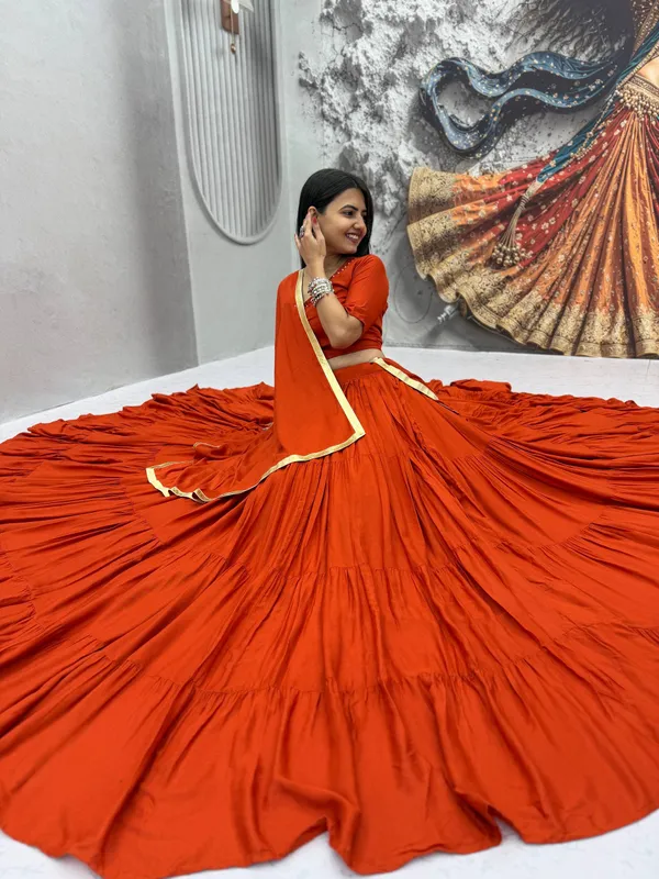 Rust_Orange_Mirror_Work_Choli_with_Pleated_Lehenga_&_Dupatta