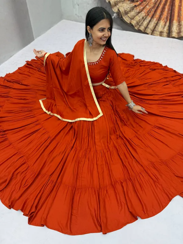 Rust_Orange_Mirror_Work_Choli_with_Pleated_Lehenga_&_Dupatta