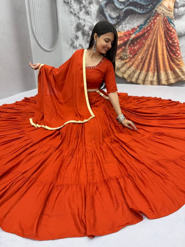 Rust_Orange_Mirror_Work_Choli_with_Pleated_Lehenga_&_Dupatta