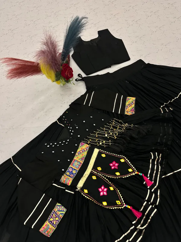 Traditional_Black_Cotton_Navratri_Chaniya_Choli_Set_with_Koti_Jacket,_Mirror_Work_&_Gota_Patti_Accent