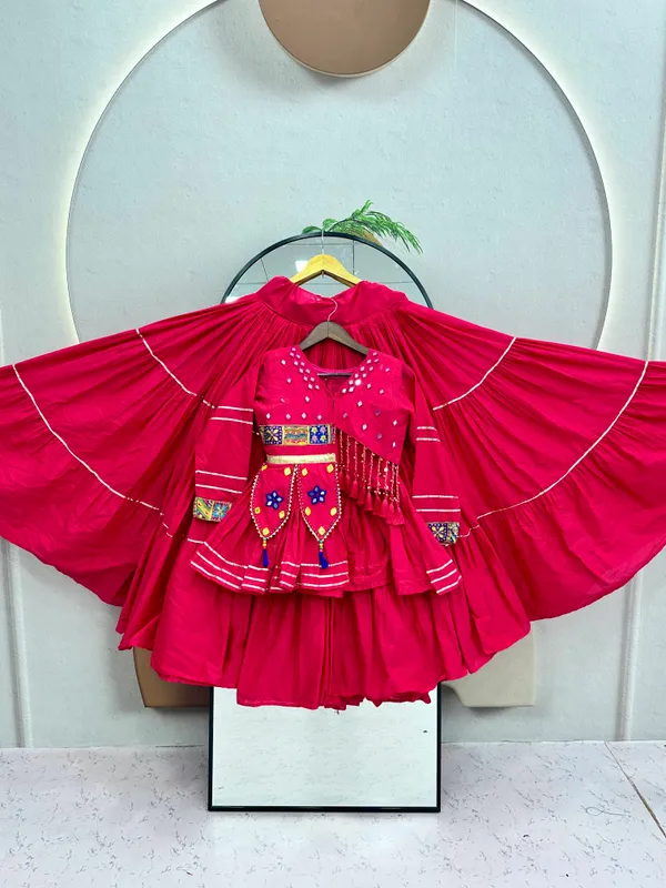 Traditional_Magenta_Cotton_Navratri_Chaniya_Choli_Set_with_Koti_Jacket,_Mirror_Work_&_Gota_Patti_Accent